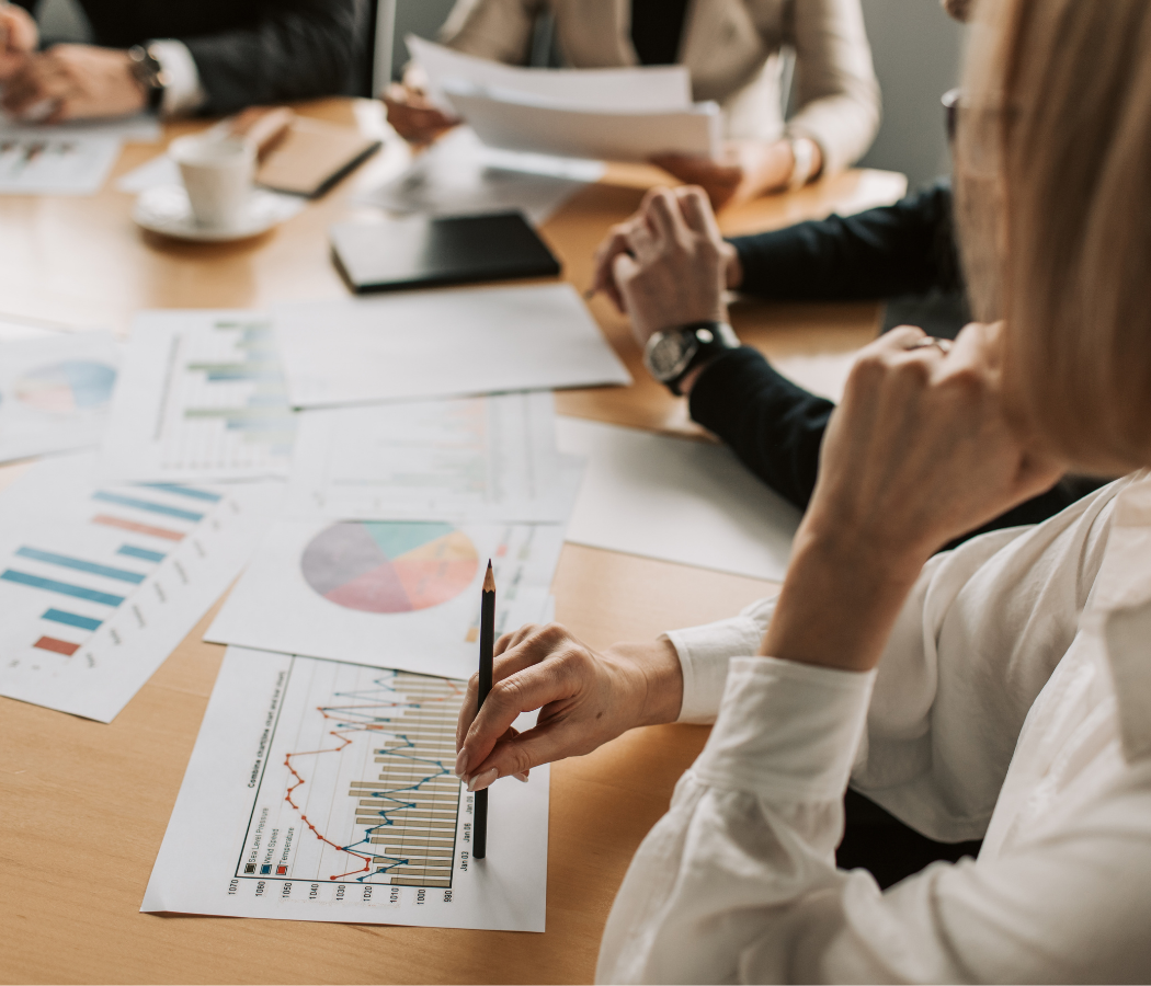 Board meeting with documents on the table